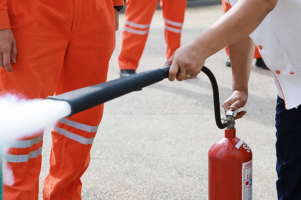 Employees,Firefighting,Training,,Concept,Employees,Hand,Using,Fire,Extinguisher,Fighting