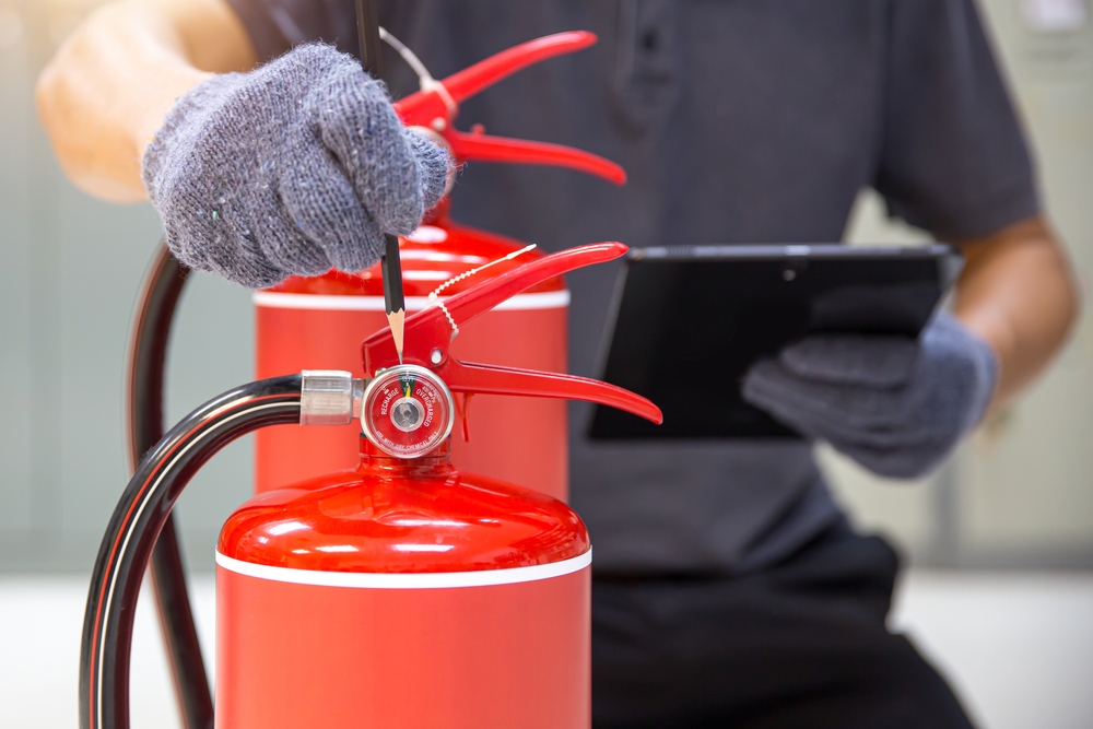 Fire,Extinguisher,,Engineer,Inspection,Checking,Pressure,Gauge,Level,Fire,Extinguisher