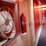 Fire,Extinguisher,And,Fire,Hose,Reel,In,Hotel,Corridor